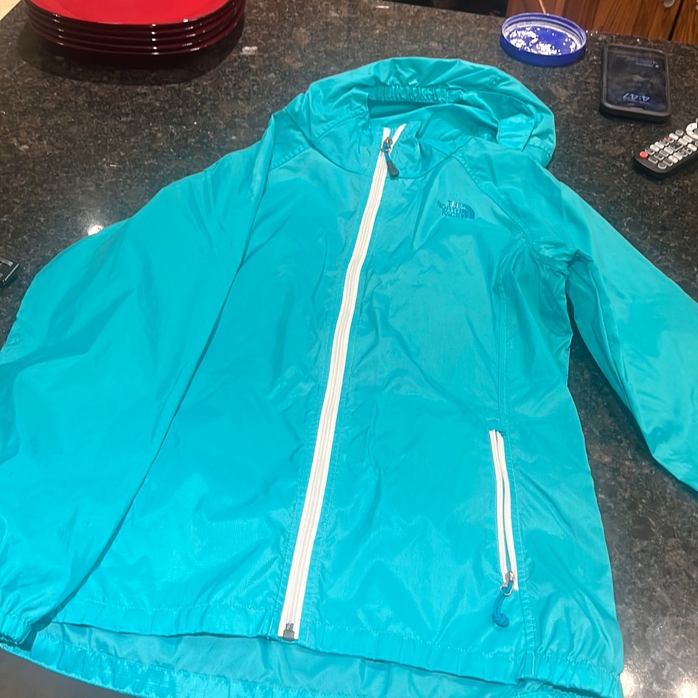 Size medium north face rain jacket